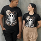 Two people wear black t-shirts with a vintage lace ghost design.
