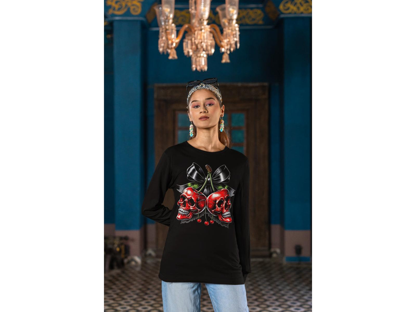 Black long-sleeve sweatshirt with a red skull cherry and bow graphic.