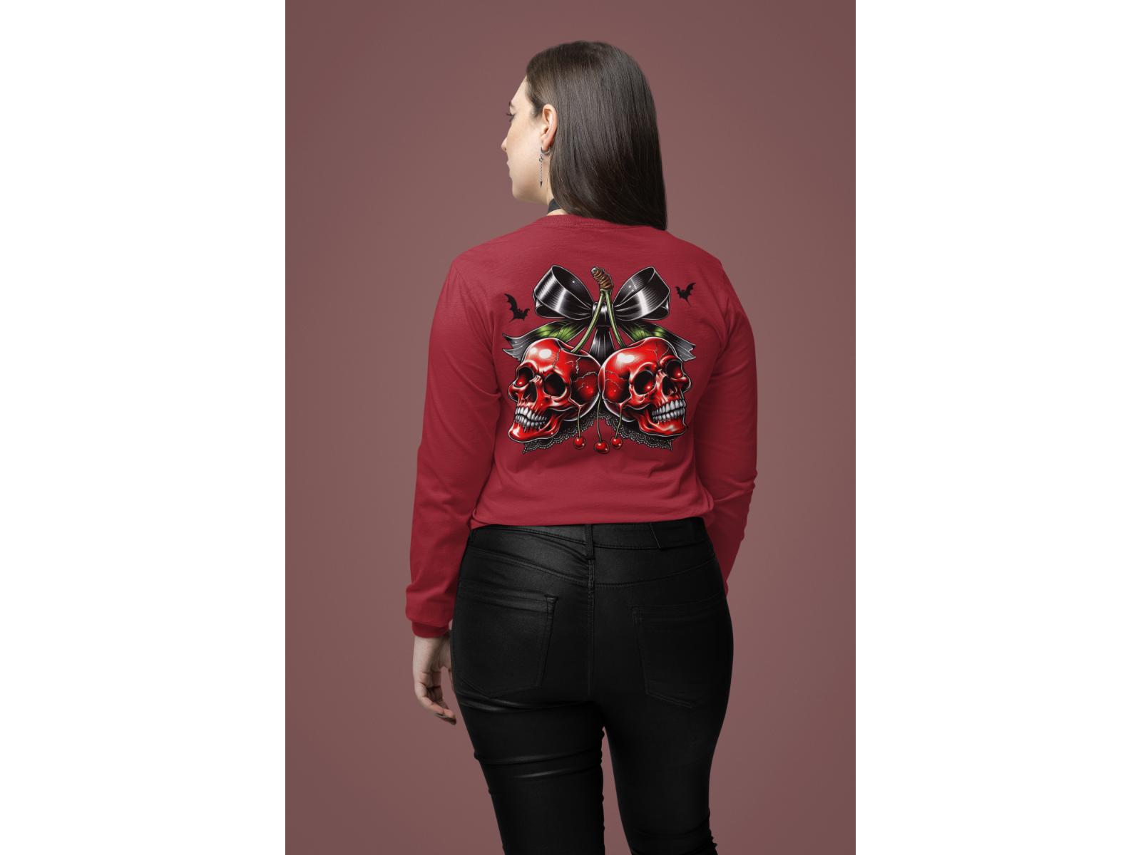 A woman from behind wears a red long-sleeve shirt with a spooky cherry and bow design.