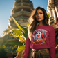 A woman wears a red long-sleeve sweatshirt with a Canadian Halloween ghost and pumpkin design.