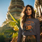 A woman wears a dark gray Halloween Town sweatshirt with a vintage pumpkin graphic.