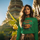 A woman wears a green Halloween Town sweatshirt with a vintage pumpkin graphic.