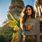 A woman wears a grey Halloween Town sweatshirt with a vintage pumpkin graphic.