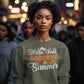 A woman wears an olive green sweatshirt with "Hello Fall GOODBYE Summer" text.