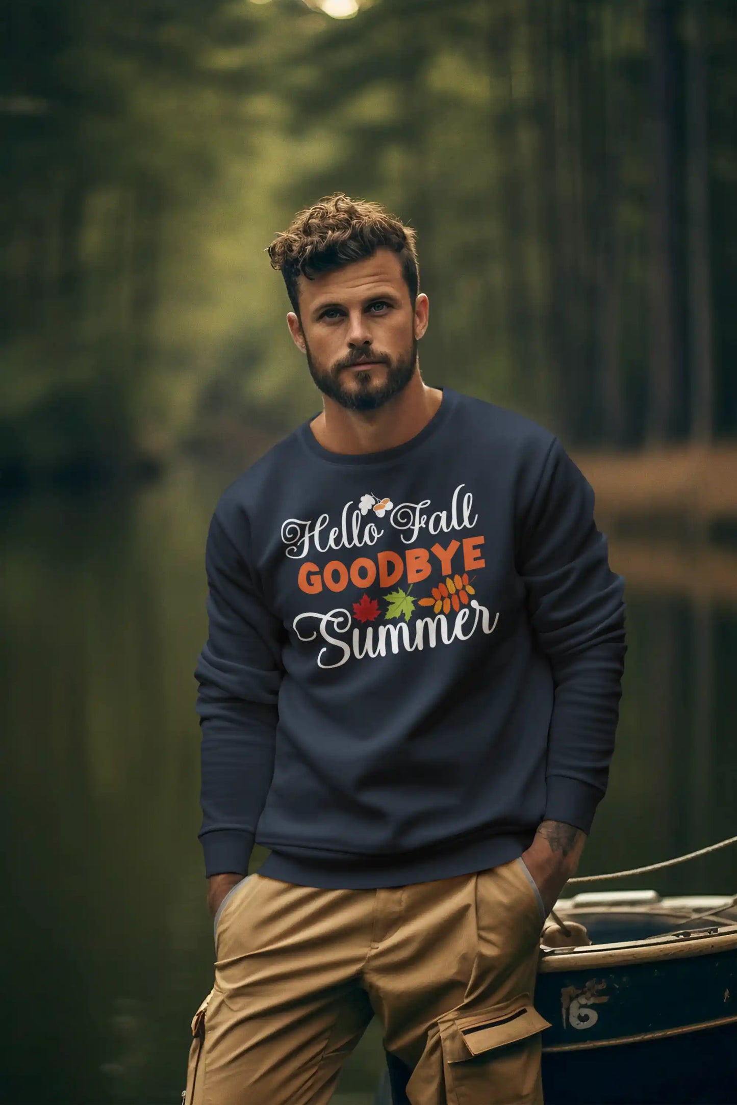 A man wears a navy sweatshirt with "Hello Fall GOODBYE Summer" text and autumn leaves.