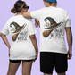 Two people wear white t-shirts with a witch hat and broom design that says "Tonight We Fly."