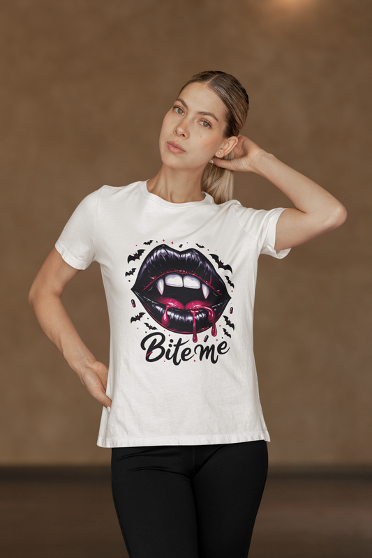 A woman wears a white t-shirt with a "Bite me" vampire lips graphic.