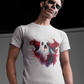 A man in skull makeup wears a white t-shirt with a ghost and red splatters.