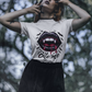 Gothic Halloween T-shirt with vampire lips and "Bite me" text.