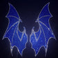 A black hoodie features two large, blue rhinestone bat wings on the back.