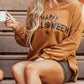 Happy Halloween graphic notched long sleeve loose top.
