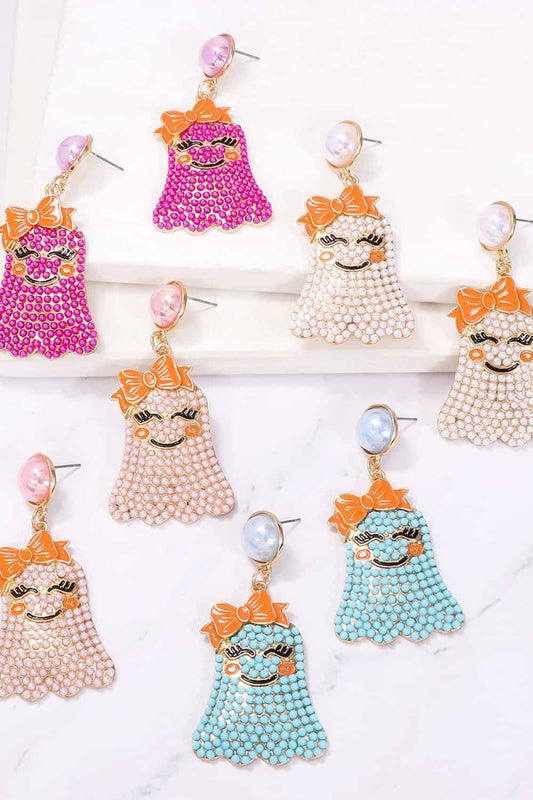 Smiling ghost shape synthetic pearl earrings in various colors.
