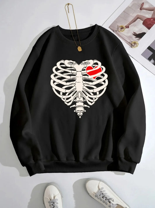 Black sweatshirt with a white skeleton rib cage and a red heart design.