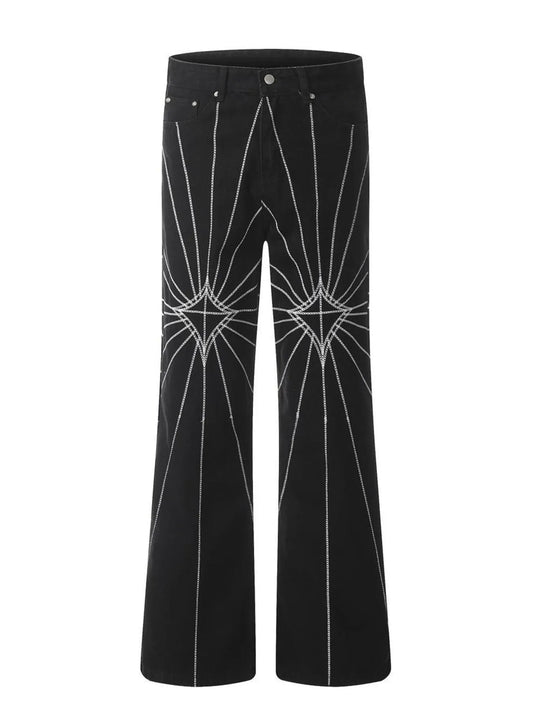 Men's black flared jeans with white spider web embroidery.