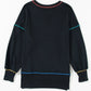 Black long-sleeve sweatshirt with colorful stitching on the seams.