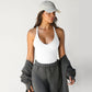 A knitted vest top is paired with a base layer