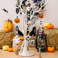 Three Halloween-themed wooden hanging ornaments featuring gnomes, pumpkins, and ghosts.
