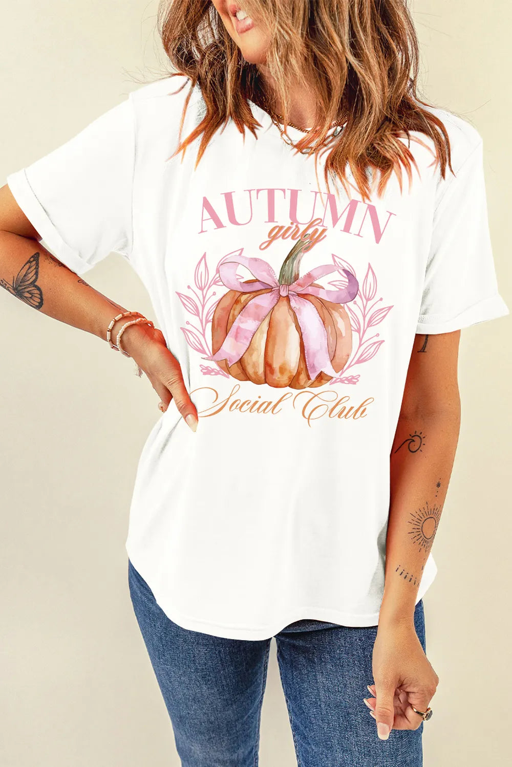White short-sleeve t-shirt with a "Autumn Girly Social Club" pumpkin graphic.