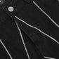 Black flared jeans with silver chain embroidery.