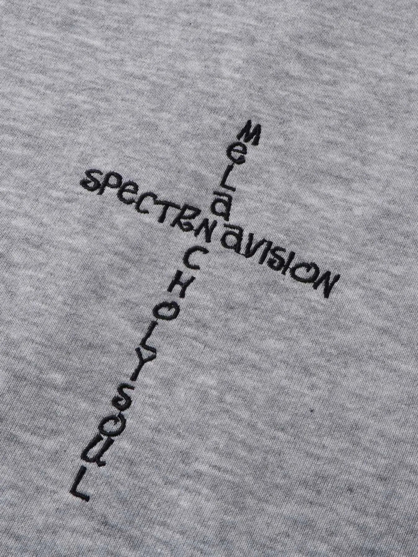 Gray hoodie with black embroidered text forming a cross shape.