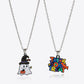Two silver chain necklaces with Halloween-themed pendants.