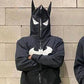 Men's black zip-up hoodie with a Batman logo and mask hood.