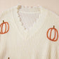 Raw hem pumpkin V-neck long sleeve sweater.