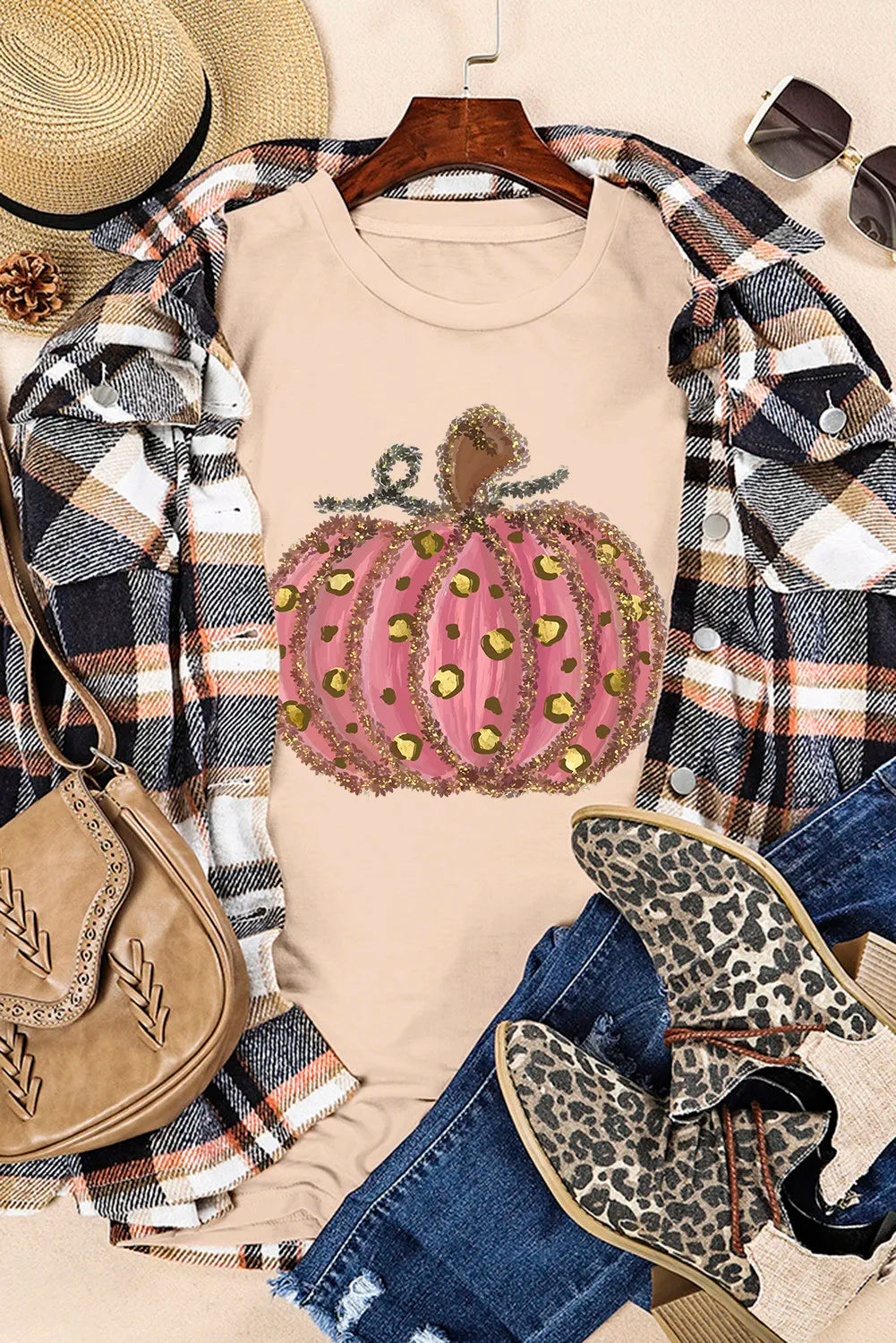 Pumpkin round neck short sleeve t-shirt with a pink leopard print pumpkin design.