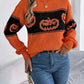 Pumpkin round neck long sleeve sweater with black jack-o'-lanterns.