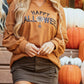 Happy Halloween graphic notched long sleeve loose top with a dark green skirt.