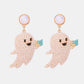 Two ghost-shaped dangle earrings adorned with synthetic pearls, each holding a turquoise "BOO" sign.