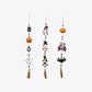 Three Halloween-themed hanging decorations featuring pumpkins, gnomes, ghosts, and a bat.