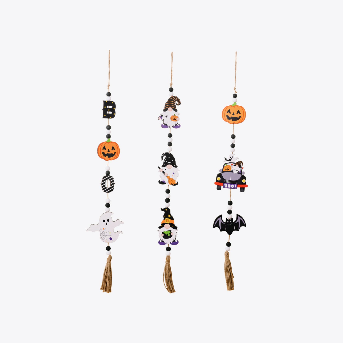 Three Halloween-themed hanging decorations featuring pumpkins, gnomes, ghosts, and a bat.