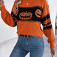 Pumpkin round neck long sleeve sweater with blue jeans.