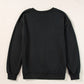 Back of a black long-sleeve sweatshirt with a round neck and ribbed cuffs and hem.