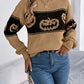 Pumpkin round neck long sleeve sweater.