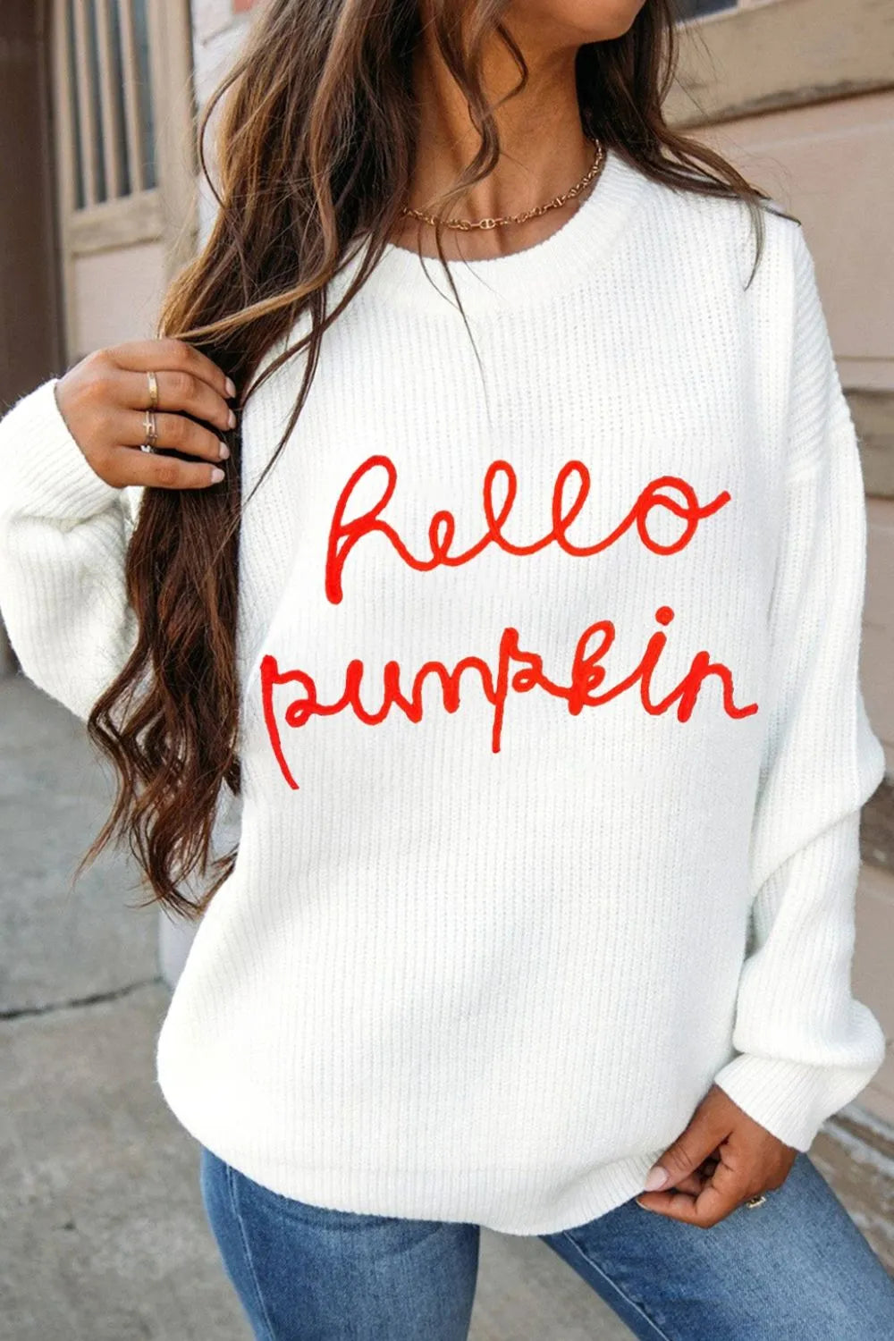 White "Hello Pumpkin" round neck long sleeve sweater.
