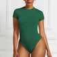 A base layer for a shaping garment