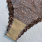 Printed base with wave-shaped edges and triangular-shaped underwear