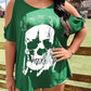 Plus size green cold shoulder t-shirt with a white skeleton graphic.